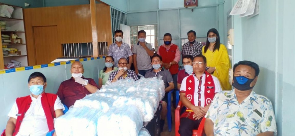 Businessman, Basu Damani and his family with some Dimapur-based civil society leaders during the face mask donation in Dimapur on May 23. (Morung Photo)